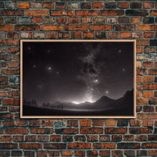 Load image into Gallery viewer, Black and white Watercolor of a starry night sky over a pine forest, framed canvas print