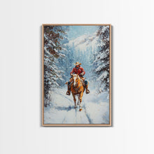Load image into Gallery viewer, Cowboy Walking Through Snowy Winter Forest Canvas Print, Western Christmas Art Gift, Holiday Wall Decor, Rustic Art, Framed Canvas Print