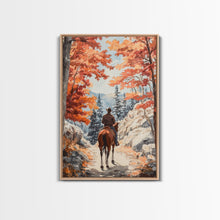 Load image into Gallery viewer, Cowboy riding through autumn forest, Framed Canvas Print, fall landscape wall art, western style decor for cozy homes, perfect gift idea