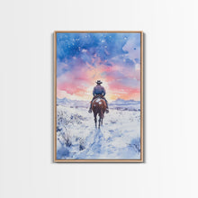 Load image into Gallery viewer, Cowboy riding through snowy sunset, Framed Canvas Print, winter landscape wall art, western decor for above sofa, rustic holiday decor