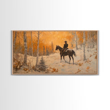 Load image into Gallery viewer, Cowboy riding horse through deep snow in a winter storm, Framed Canvas Print, dynamic winter wall art, rustic western home decor