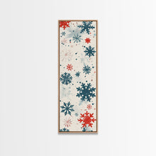 Cargar imagen en el visor de la galería, Festive Snowflakes In Red, Blue, And White On A Cream Background, Skinny Art Tall Wall Art Framed Canvas Print Japanese Style Art