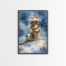 Load image into Gallery viewer, Snowy lighthouse under moonlit sky with wreath, Framed Canvas Print, beach Christmas decor for winter wonderland, holiday wall art