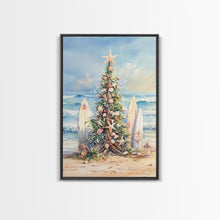 Cargar imagen en el visor de la galería, Coastal Christmas tree with surfboards at the beach Framed Canvas Print, tropical holiday wall art beach Christmas decor Christmas prints