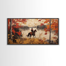 Load image into Gallery viewer, Cowboy on mountainside with red autumn leaves rugged cliffs, Framed Canvas Print, fall landscape wall art, western decor with warm colors
