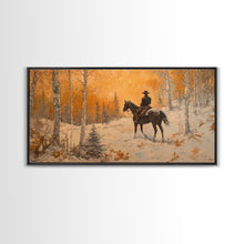 Load image into Gallery viewer, Cowboy riding horse through deep snow in a winter storm, Framed Canvas Print, dynamic winter wall art, rustic western home decor