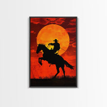 Load image into Gallery viewer, Cowboy Riding Horse into the Sunset | Framed Canvas Print | Western Silhouette Art | Rustic Cowboy Wall Art for Living Room