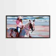 Load image into Gallery viewer, Cowgirl in Pink Shirt Riding Horse by the Sea, Beautiful Framed Canvas Print, Coastal Living Room Art, Beach Bedroom Decor, Horse Art