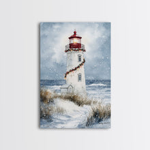 Carregar imagem no visualizador da galeria, Snowy lighthouse wrapped with festive garland, Framed Canvas Print, beach Christmas decor, holiday wall art perfect for coastal homes