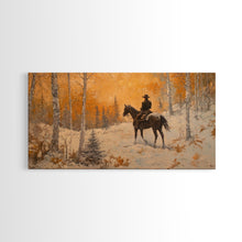 Load image into Gallery viewer, Cowboy riding horse through deep snow in a winter storm, Framed Canvas Print, dynamic winter wall art, rustic western home decor