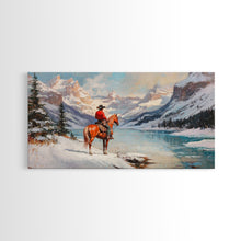 Load image into Gallery viewer, Cowboy on horseback near hay bale outside rustic barn, snow-covered landscape, Framed Canvas Print, winter wall art, rustic farmhouse decor