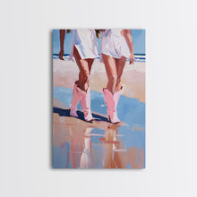 Load image into Gallery viewer, Cowgirls walking on the beach wearing pink cowboy boots, artistic reflection Framed Canvas Print - beach fashion, summer decor, vibrant art