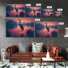 Carregar imagem no visualizador da galeria, A stork standing in a calm lake at sunset, framed canvas print