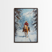 Load image into Gallery viewer, Cowboy Walking Through Snowy Winter Forest Canvas Print, Western Christmas Art Gift, Holiday Wall Decor, Rustic Art, Framed Canvas Print