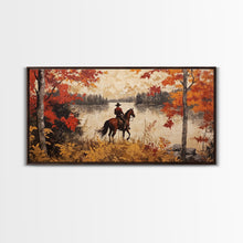 Load image into Gallery viewer, Cowboy on mountainside with red autumn leaves rugged cliffs, Framed Canvas Print, fall landscape wall art, western decor with warm colors