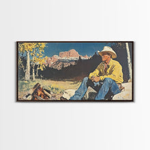 Load image into Gallery viewer, Bold monochromatic Framed Canvas Print showcasing a woman in a cowboy hat with horses in a snowy mountain landscape, rustic winter wall art