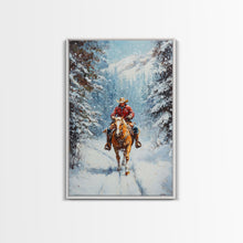 Load image into Gallery viewer, Cowboy Walking Through Snowy Winter Forest Canvas Print, Western Christmas Art Gift, Holiday Wall Decor, Rustic Art, Framed Canvas Print
