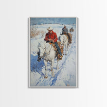 Load image into Gallery viewer, Cowboy Riding Horses in Snow Canvas Print, Winter Wall Art, Rustic Christmas Decor, Holiday Gift Idea, Seasonal Art, Framed Canvas Print