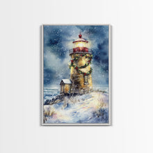 Load image into Gallery viewer, Snowy lighthouse under moonlit sky with wreath, Framed Canvas Print, beach Christmas decor for winter wonderland, holiday wall art