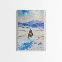 Load image into Gallery viewer, Cowboy riding through snowy mountain pass, Framed Canvas Print, western winter landscape wall art, farmhouse holiday decor Christmas gift