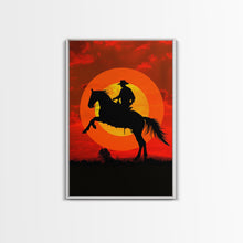 Load image into Gallery viewer, Cowboy on Horse with Dramatic Sunset Background | Framed Canvas Print | Western Silhouette Art | Sunset Cowboy Wall Art for Bedroom