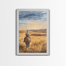 Load image into Gallery viewer, Cowboy leading cattle across golden prairie, Framed Canvas Print, western landscape wall art for rustic farmhouse decor, gift idea holiday
