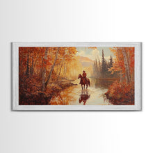 Load image into Gallery viewer, Black white cowboy riding toward snow-covered mountains, Framed Canvas Print, minimalist winter wall art, moody landscape, western decor