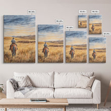 Load image into Gallery viewer, Cowboy leading cattle across golden prairie, Framed Canvas Print, western landscape wall art for rustic farmhouse decor, gift idea holiday