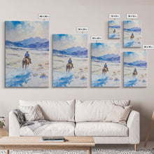 Load image into Gallery viewer, Cowboy riding through snowy mountain pass, Framed Canvas Print, western winter landscape wall art, farmhouse holiday decor Christmas gift