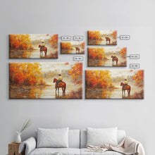 Load image into Gallery viewer, Cowboy sitting by campfire near a lake in the woods with autumn leaves, Framed Canvas Print, moody fall wall art, rustic western home decor