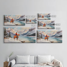 Load image into Gallery viewer, Cowboy on horseback near hay bale outside rustic barn, snow-covered landscape, Framed Canvas Print, winter wall art, rustic farmhouse decor