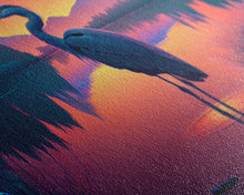 Carregar imagem no visualizador da galeria, A stork standing in a calm lake at sunset, framed canvas print