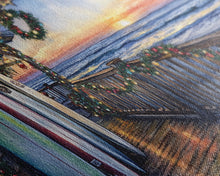 Load image into Gallery viewer, Beachfront porch with surfboards and Christmas lights, Framed Canvas Print with wreaths festive lights, coastal holiday wall art and decor