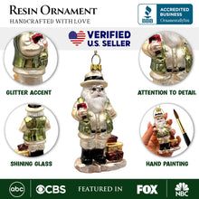 Carregar imagem no visualizador da galeria, Adventurous Safari Santa Handblown Glass Ornament, African Jungle Explorer Travel Themed Christmas Decor