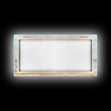 Load image into Gallery viewer, Beach Christmas scene with surfboards and decorated tree, tropical holiday art framed canvas print, perfect coastal seasonal decor