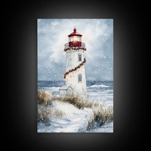 Carregar imagem no visualizador da galeria, Snowy lighthouse wrapped with festive garland, Framed Canvas Print, beach Christmas decor, holiday wall art perfect for coastal homes
