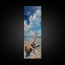Carregar imagem no visualizador da galeria, Framed Canvas Print Tall Art Featuring a Piece of Driftwood on a Sandy Beach with Bright Blue Sky and Ocean Waves, Ideal Skinny Art for Coastal Homes