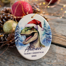 Load image into Gallery viewer, Dinosaur with Santa Hat Personalized Ornament, Winter Forest Christmas Gift With Custom Name and Date