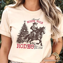 Load image into Gallery viewer, Annual North Pole Rodeo T-Shirt, Funny Cowboy Santa Christmas Tee for Country Lovers