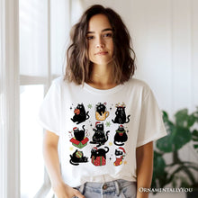 Cargar imagen en el visor de la galería, Christmas Black Cats T‑Shirt, Whimsical Cats with Santa Hat Tee