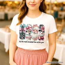 Load image into Gallery viewer, Coquette Pink Christmas T‑Shirt, It's The Most Wonderful Time Of The Year Vintage Tree, Reindeer, Santa and Snowman Tee