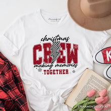 Cargar imagen en el visor de la galería, Christmas Crew Making Memories Together T‑Shirt, Checkered Lightning Retro Holiday Tee
