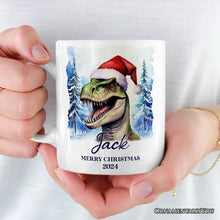 Load image into Gallery viewer, Dinosaur with Santa Hat Personalized Mug, Winter Forest Christmas Gift With Custom Name and Date