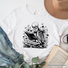 Carregar imagem no visualizador da galeria, Gothic Reading Skeleton T-Shirt, Floral Halloween Tee for Spooky Bookworms