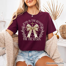 Carregar imagem no visualizador da galeria, Jesus Is the Reason Christmas T‑Shirt, Coquette Gold Bow Cross Tee for Faithful Women