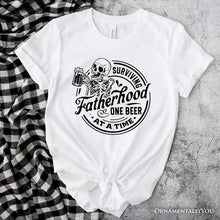Load image into Gallery viewer, Surviving Fatherhood Skeleton Beer T-Shirt, White Vintage Tee for Tired and Hilarious Dads