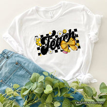 Load image into Gallery viewer, Teach Checkered Coquette Bow T-Shirt, White and Natural Retro Tee for Trendy Teachers