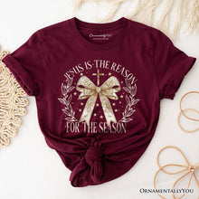 Carregar imagem no visualizador da galeria, Jesus Is the Reason Christmas T‑Shirt, Coquette Gold Bow Cross Tee for Faithful Women