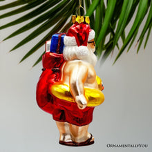 Carregar imagem no visualizador da galeria, Santa on Summer Vacation in the Pool Quirky Glass Christmas Ornament, Rubber Duckey Tropical Holiday Decor