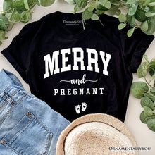 Carregar imagem no visualizador da galeria, Merry and Pregnant T‑Shirt, Baby Announcement Christmas Tee for New Mom